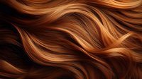 Flowing waves of copper and caramel colored hair create dynamic pattern of glossy strands against dark background, showing natural movement and healthy shine.