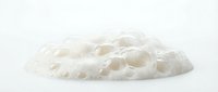 White soap foam with bubbles isolated on clean background for skincare and hygiene product advertising and cosmetic design projects.