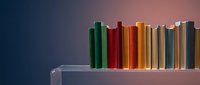 Colorful books arranged in row on white shelf against gradient background for education and learning concepts in library or study space.