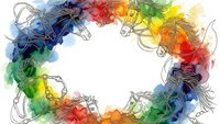 Colorful watercolor unicorn heads forming circular frame border on white background. Fantasy mythical creatures with flowing manes in rainbow hues for magical designs.
