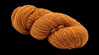 Golden brown twisted yarn skein isolated on transparent background, ready for crafting, knitting tutorials, textile design, print-on-demand products, and educational materials.