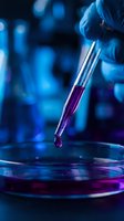 Laboratory pipette dispensing purple liquid into petri dish with blue bokeh background, suitable for scientific research, medical testing, and biotechnology applications.