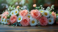 Fresh floral arrangement with delicate pink roses and white daisies with baby's breath on wooden surface, creating romantic wedding or celebration decor.