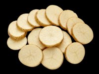 Sliced raw potatoes arranged in a group, isolated on transparent background. Ready for food packaging, menu design, stickers, print on demand, and T-shirt clipart use.