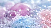 Colorful soap bubbles floating over foamy surface with pastel pink and blue tones creating dreamy bath time atmosphere for relaxation and wellness concepts.