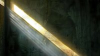 Dramatic diagonal light beam pierces dark space, illuminating floating dust particles against textured green wall, creating atmospheric moody ambiance.
