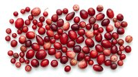Fresh red cranberries scattered on white background, organic superfood berries for healthy eating, cooking ingredients, holiday recipes and natural nutrition.