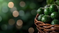 Fresh green limes with water drops in rustic woven basket against dark background with soft bokeh lights, macro food photography composition.