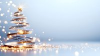 Glowing spiral Christmas tree made of light strands against soft blue background with golden bokeh lights and copy space for seasonal greetings.
