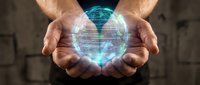 Male hands holding glowing digital globe with network connections, representing global technology, data transfer, and worldwide business communication solutions.