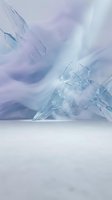Translucent ice shards and frozen crystalline structures emerge from snowy white ground against soft lavender and blue atmospheric backdrop, suitable for winter themes and abstract backgrounds.