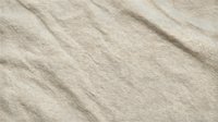 Beige linen fabric with natural wrinkles and folds, suitable for textile, fashion, and interior design projects.