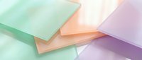 Stacked translucent glass sheets in pastel green, peach, and purple tones with soft lighting and shadows, suitable for modern design backgrounds.