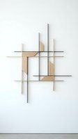 Modern geometric wall sculpture with intersecting wooden and metal rods creating abstract composition on white background for contemporary interior design.