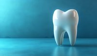 White molar tooth on turquoise background with soft lighting and shadow, dental care concept for orthodontics, stomatology and oral healthcare promotion.