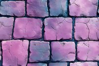 Pink and purple stone wall texture with rough square blocks creating geometric pattern. Cracked surface with weathered appearance adds vintage character.