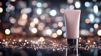 Cosmetic tube on glittery surface against blurred bokeh lights background creates luxurious beauty product atmosphere. Elegant skincare packaging presentation.