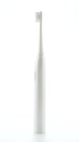 White electric toothbrush with replaceable brush head isolated on white background, ready for dental care product design, packaging, and healthcare marketing materials.
