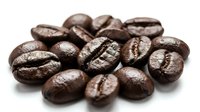 Roasted coffee beans with rich brown color and detailed surface texture, suitable for beverage packaging, café menus, and coffee product marketing materials.