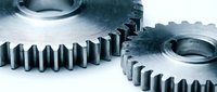 Industrial metal gears with interlocking teeth for mechanical engineering and manufacturing applications in modern machinery systems.