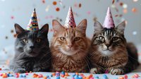 Three adorable cats wearing festive party hats surrounded by colorful confetti celebrating birthday or special occasion, pets looking at camera against gray background.