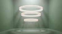 Floating white circular LED light rings suspended in minimalist green room with soft illumination, suitable for modern interior design, product display, and contemporary lighting concepts.