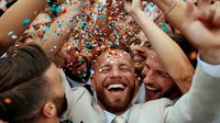 Joyful diverse group of friends celebrating with confetti, showing genuine emotions and laughter at outdoor party. Natural candid moment of happiness and friendship.