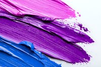 Vibrant smears of pink, purple and blue cosmetic texture on white background, macro shot showing creamy makeup product swatches with glossy finish.