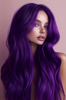Young woman with vibrant purple hair and natural makeup against pink background, showcasing modern hair coloring trend for salon advertising.