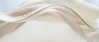 Elegant flowing silk fabric with soft beige and cream tones creating graceful waves and curves against neutral background for luxury design projects.