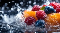 Fresh berries and orange slices splashing in crystal clear water with bokeh light effects in background, macro food photography for healthy lifestyle concept.