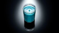 Turquoise scented candle in clear glass jar with burning flame on dark reflective surface creating dramatic lighting for spa and relaxation concepts.