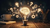 Creative lightbulb with glowing brain inside surrounded by question marks and gears on wooden desk. Innovation brainstorming concept for business solutions.