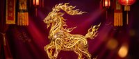 Golden dragon ornament with flowing mane and flames on red background with traditional lanterns for Chinese New Year celebration and festive decoration.