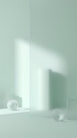 Minimalist interior scene with soft natural light casting shadows on sage green walls, featuring geometric shapes and spheres for modern design projects.