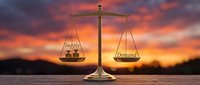 Supply and demand balance scale concept at sunset with dramatic sky background for economic business presentations and financial market analysis.