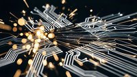 Circuit board pathways with glowing golden light particles flowing through metallic lines on dark background, representing digital technology, data transmission, and network connectivity.