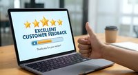 Professional giving thumbs up to five star customer feedback rating on laptop screen in modern office workspace for business satisfaction survey.