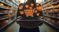 Person holding smartphone in supermarket aisle with glowing shopping cart icons floating above screen, representing digital commerce and mobile grocery shopping experience.