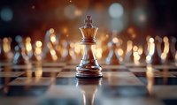 Chess king piece standing on board with blurred golden bokeh background, dramatic lighting creates atmosphere of strategy and leadership in competitive game.