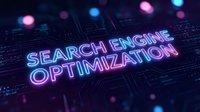 Search engine optimization neon text glowing on dark digital circuit board background with colorful lights for technology and marketing concepts.