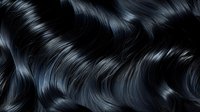 Luxurious black hair waves with glossy shine and smooth texture for beauty and haircare concepts.