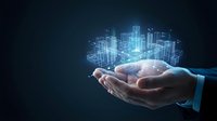 Open palm holding glowing holographic cityscape with digital buildings and light particles, representing smart city technology, urban development, and innovation for business solutions.
