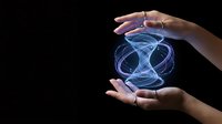 Hands protecting glowing blue energy sphere with swirling light trails on black background for technology and innovation concepts.