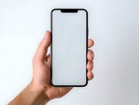 Hand holding modern smartphone with blank white screen against light background, mockup for app or website presentation and design purposes.
