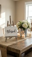 Rustic farmhouse dining table with blessed sign on easel, white hydrangeas in galvanized bucket, mason jar candles, and burlap runner.