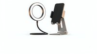 Smartphone holder with LED ring light for content creation and video calls isolated on white background for design projects.