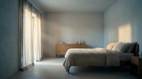 Serene bedroom interior with wooden bed frame, soft natural light from sheer curtains, minimalist decor, and calming blue-gray walls for home design and lifestyle.