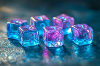 Translucent polyhedral dice with glowing neon blue and magenta crystalline effects, isolated on dark textured surface for tabletop gaming and design projects.