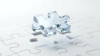 Metallic chrome puzzle piece floating above white jigsaw puzzle with missing slot, representing solution and completion in business strategy.